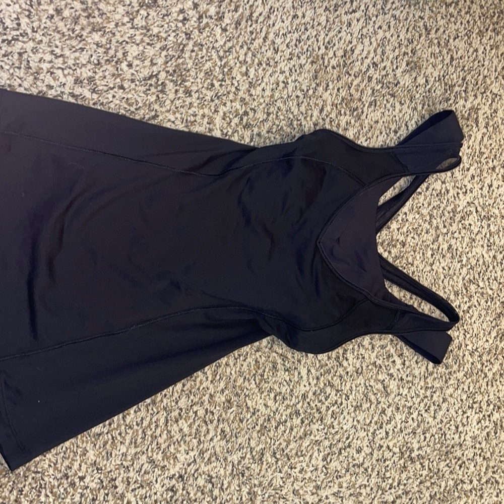 Lululemon workout tank top. Has minimal wear on it and no padding in the top.
